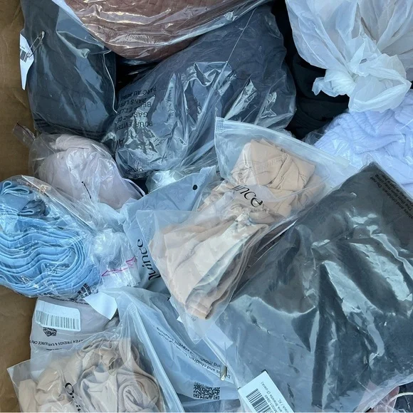 Quince Clothing Collection in Black, Blue, and Beige - Picture 2 of 4